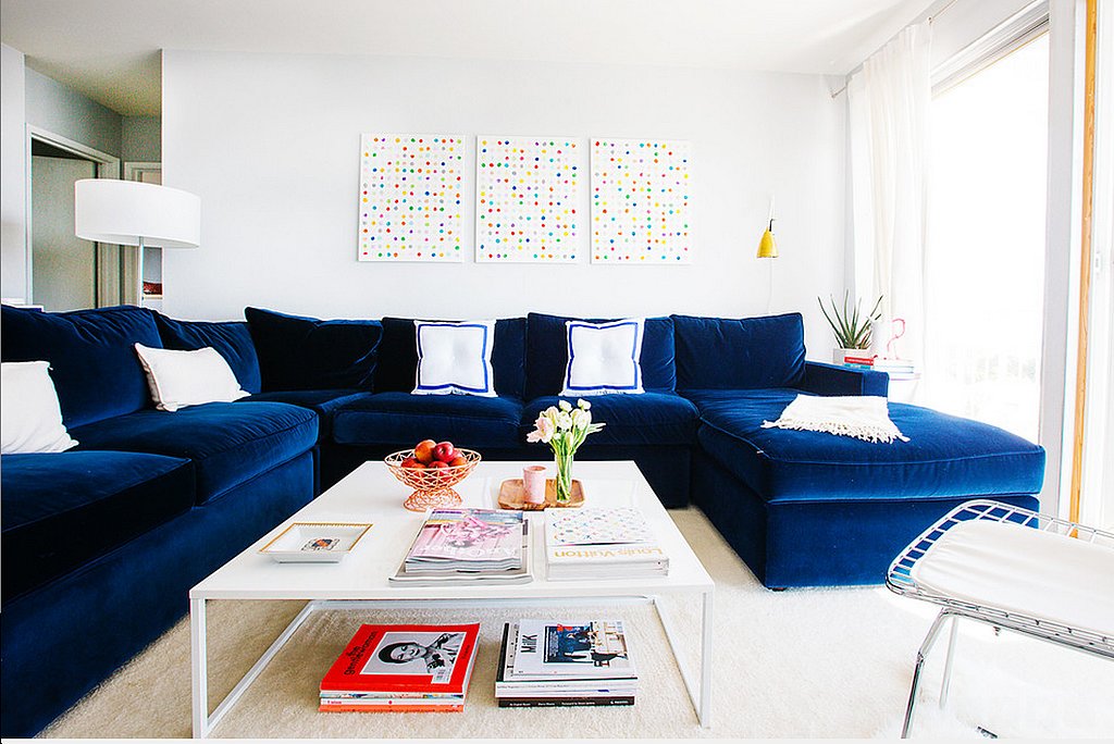 white living room blue sofas