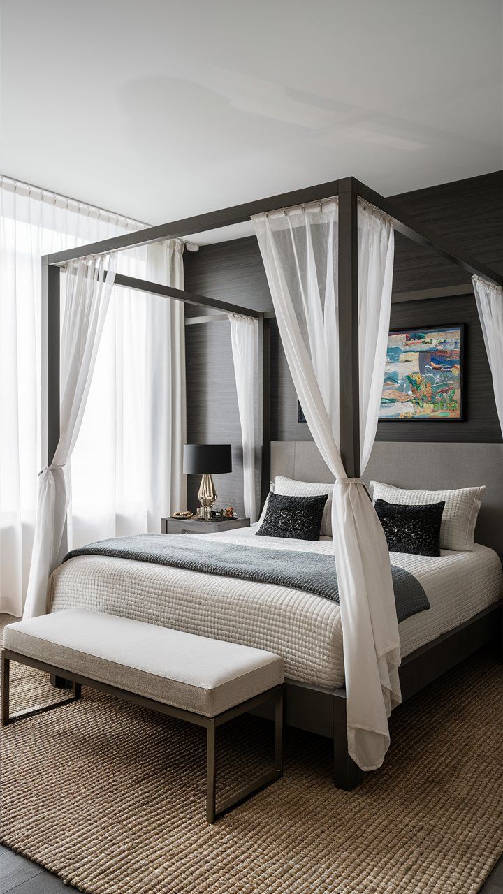 Modern canopy bed with sheer white curtains