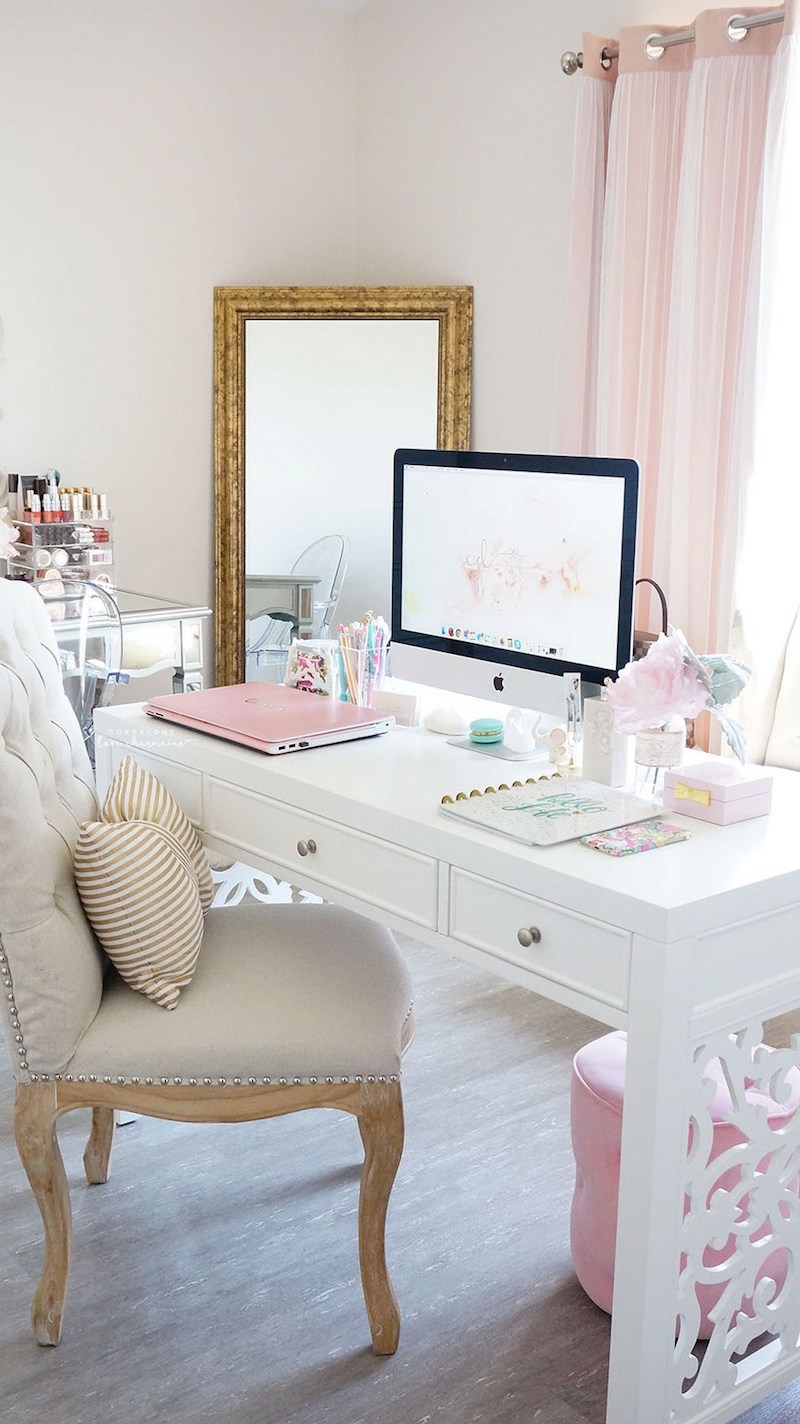 White cut-out desk with tufted office chair