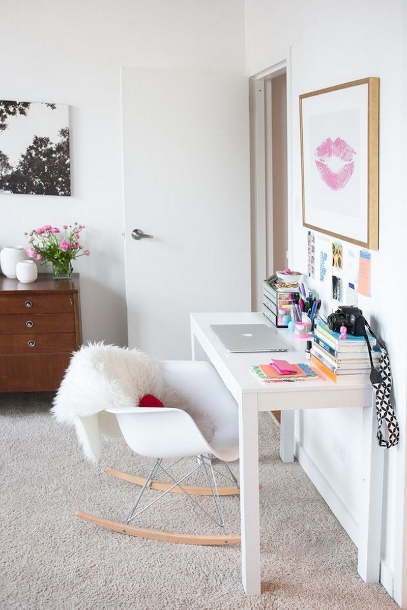 White minimalist desk with rocking office chair