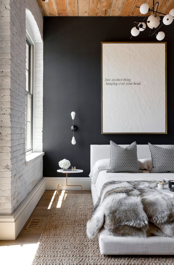 Black Wall Interior accent wall next to white brick wall