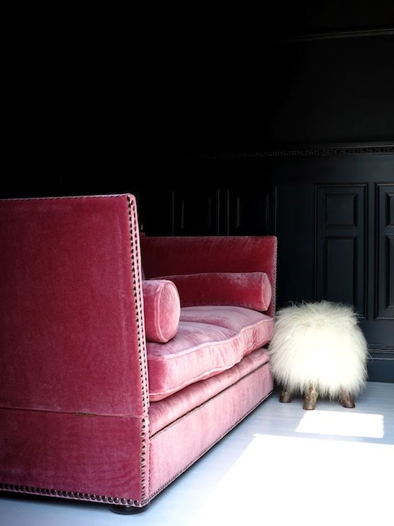 Black Wall Interior pink velvet sofa