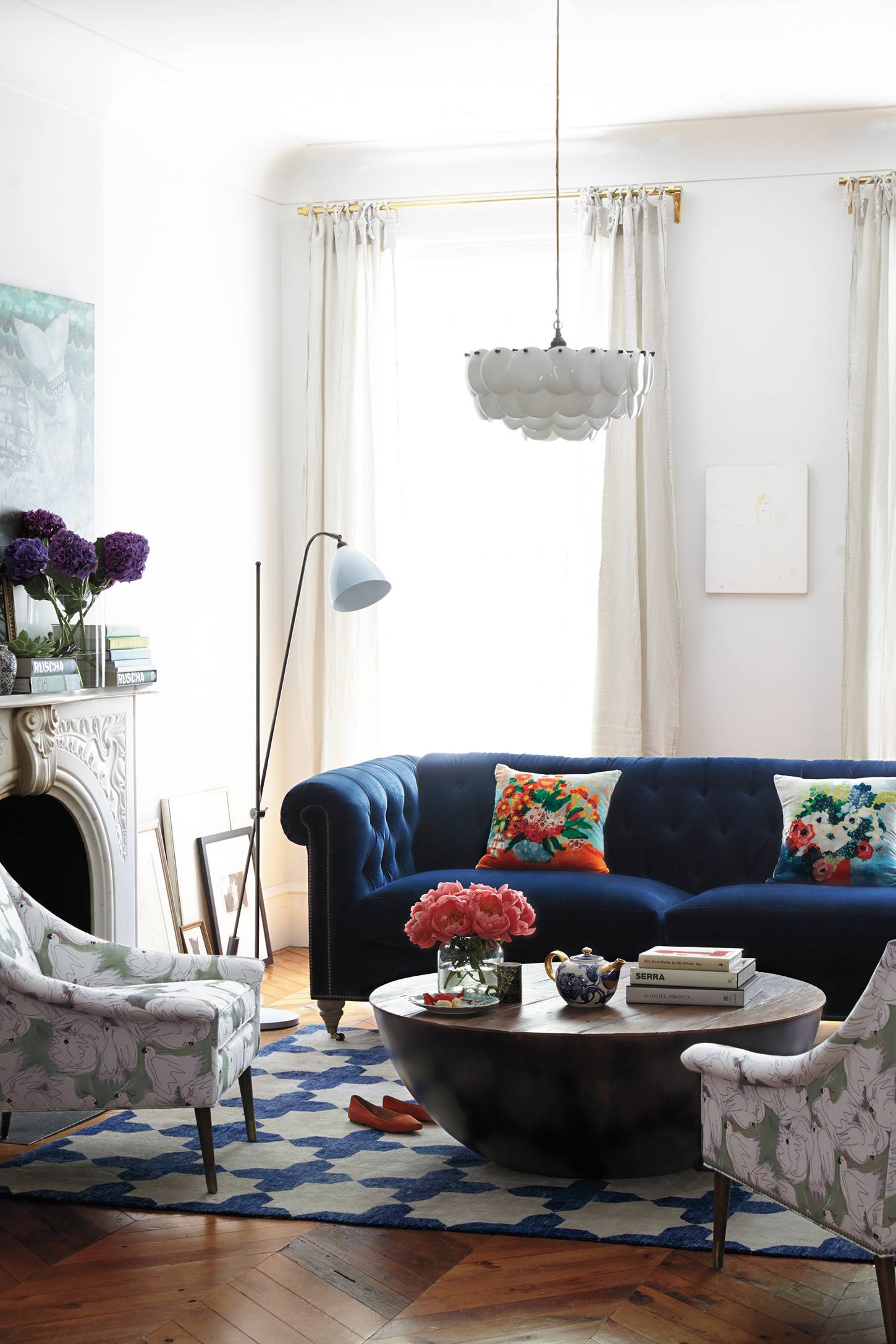 Shop this Blue Velvet Sofa Lyle Chesterfield Sofa from Anthropologie