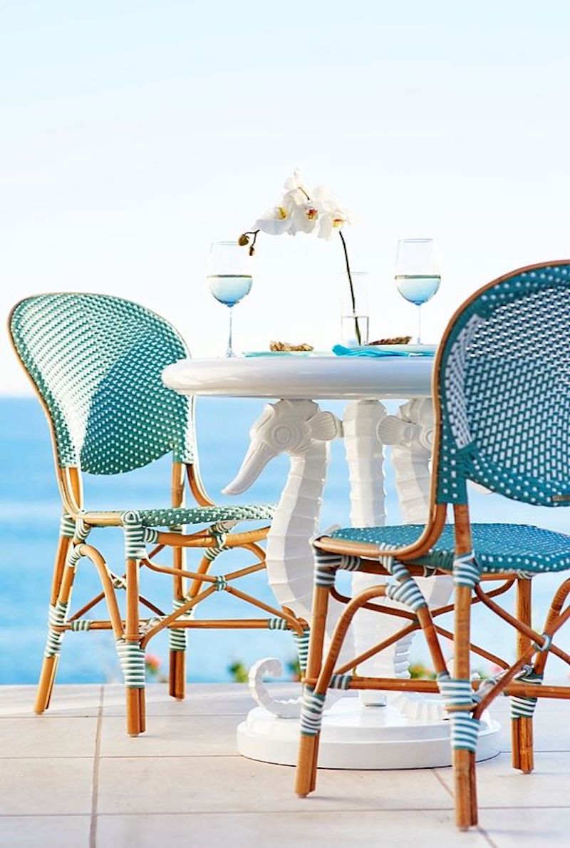 Azul blue french bistro chairs overlooking ocean via Frontgate