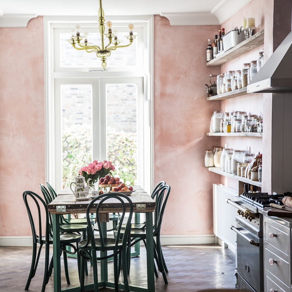 Pink Eat-in Kitchen design with open shelving in London