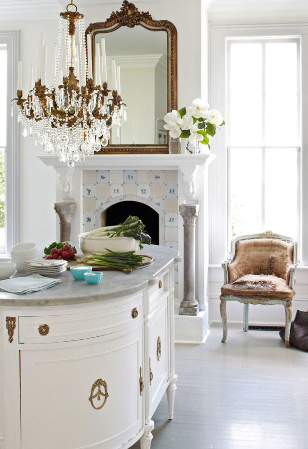 European Kitchen with Chandelier hung over a table