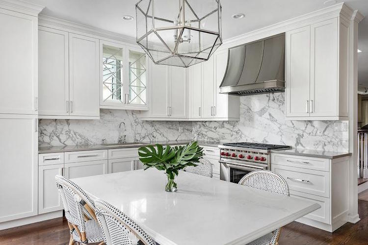 Marble Kitchen with French Bistro Chairs via Elizabeth Taich Design