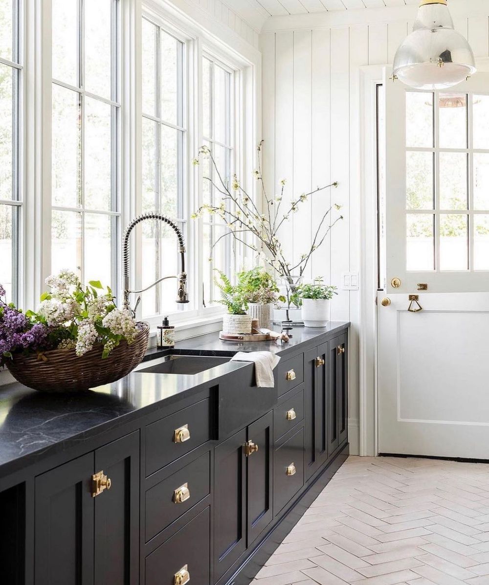 Black marble kitchen countertop with black cabnets studiomcgee