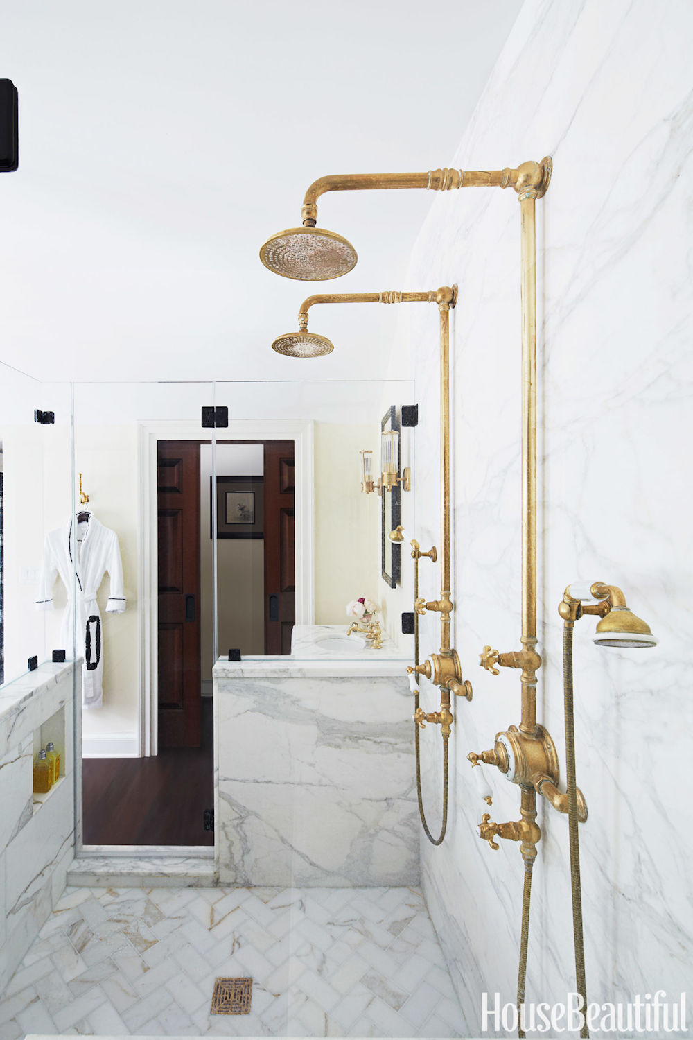 Brass Shower Heads in Marble Bathroom