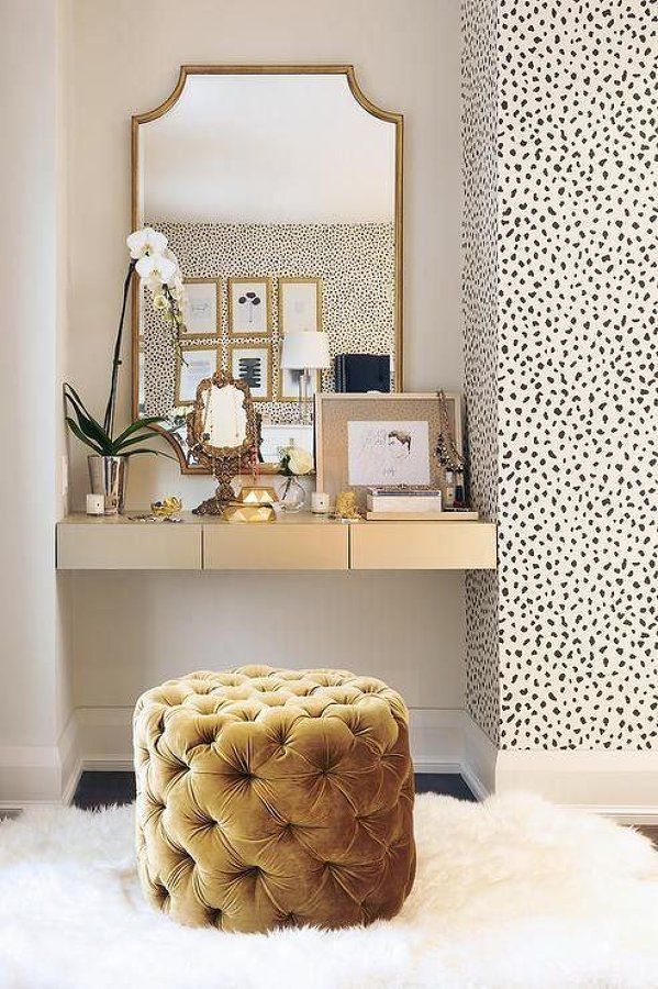 Golden Yellow Tufted Stool in front of Gold Vanity