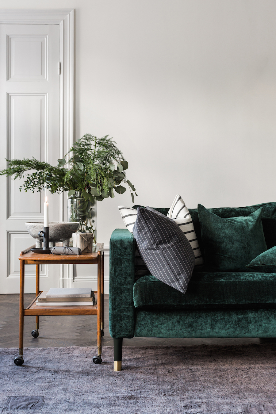 Green Velvet Sofa with Wood Side Table