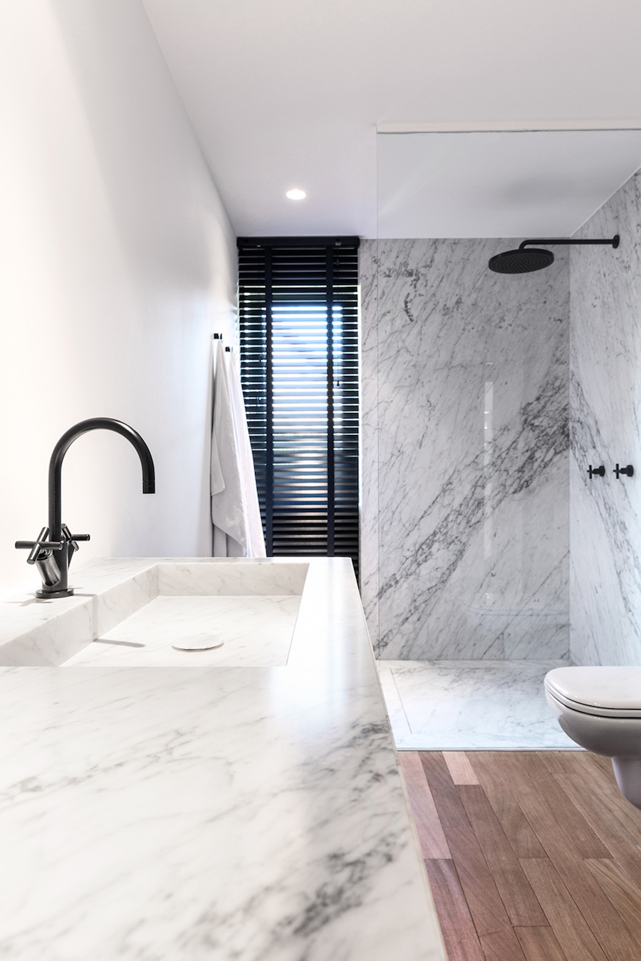 Marble Bathroom with Wood Floor