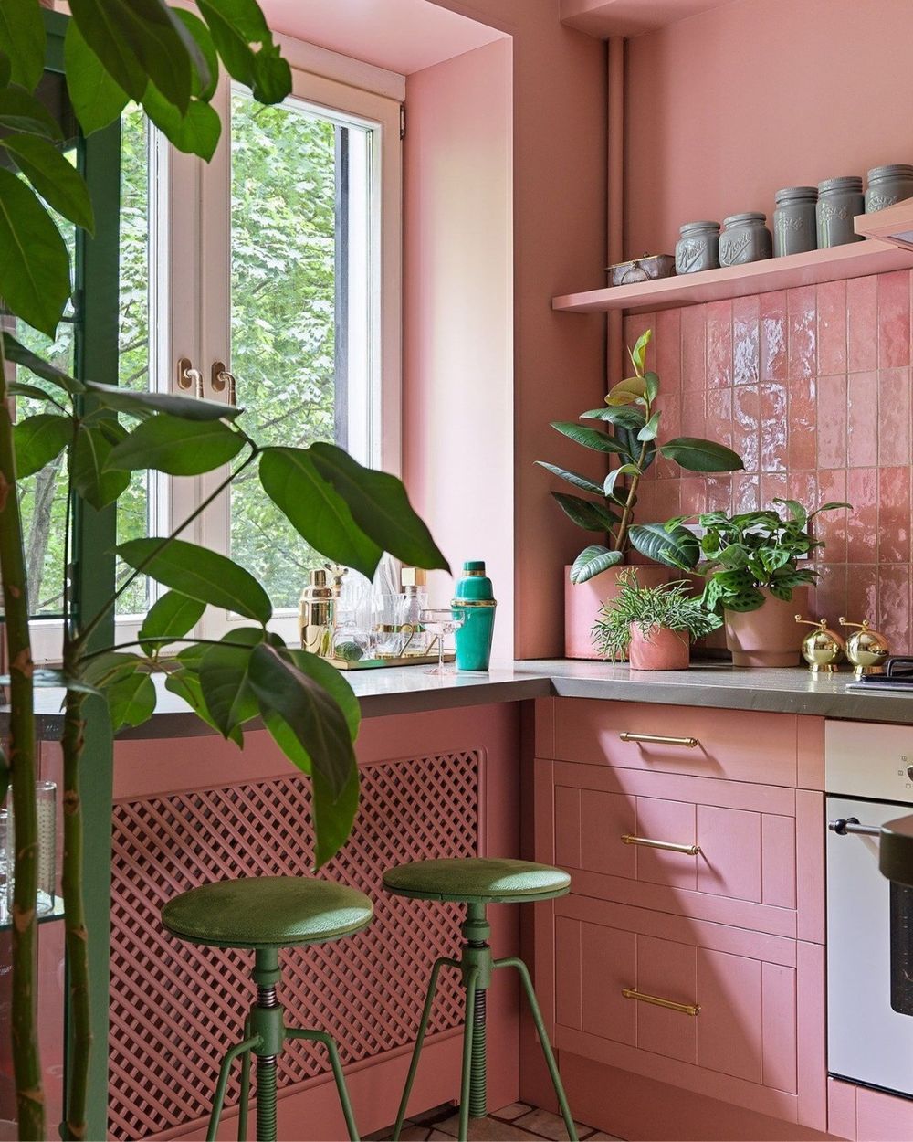 Pink kitchen backsplash idesa cabinets boho plants @archdigest