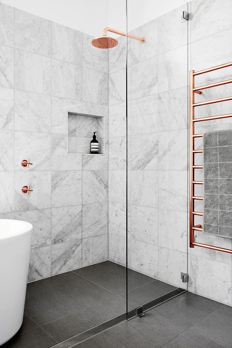 Rose Gold Fixtures and Rack in Marble Shower