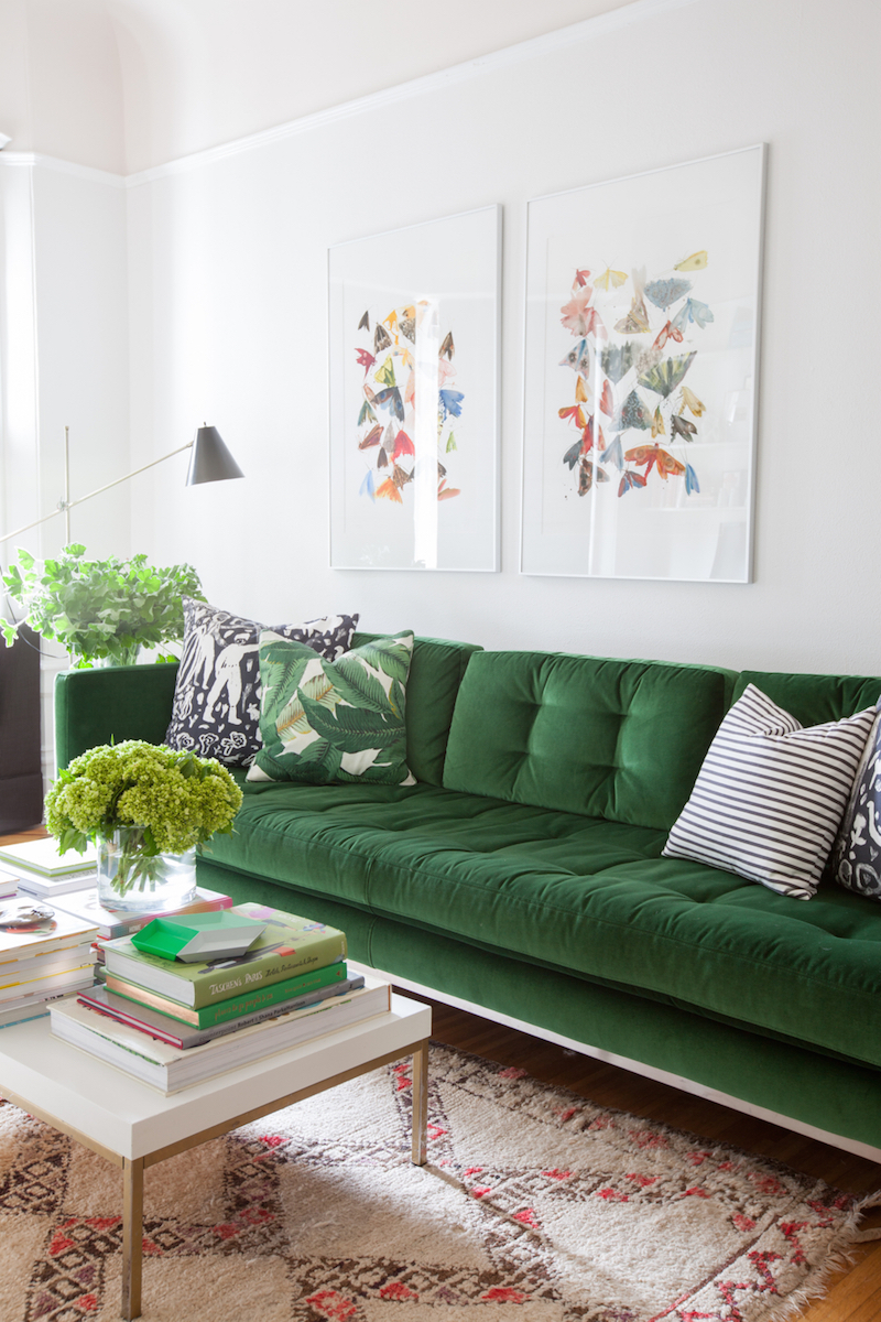 Soft Green Velvet Sofa with Butterfly Artwork