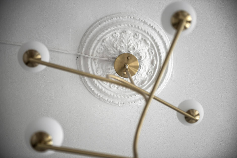 Brass ceiling lamp in Scandinavian living room