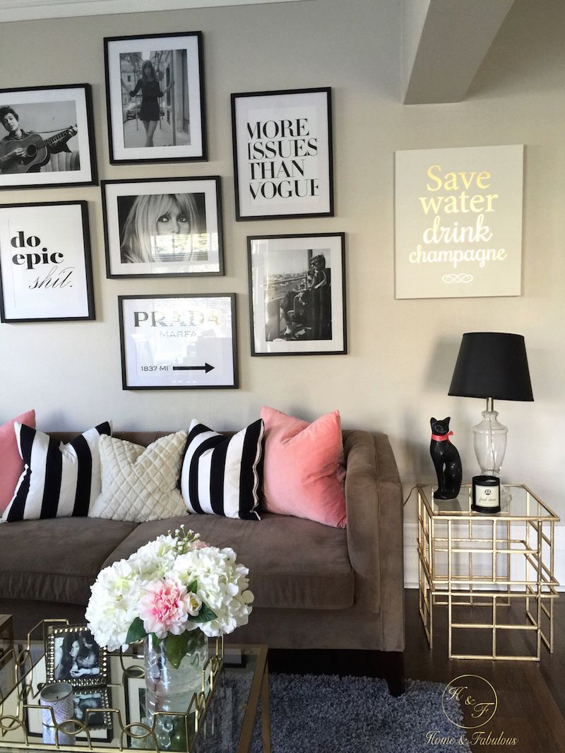 Brown couch with pink twin throw pillows