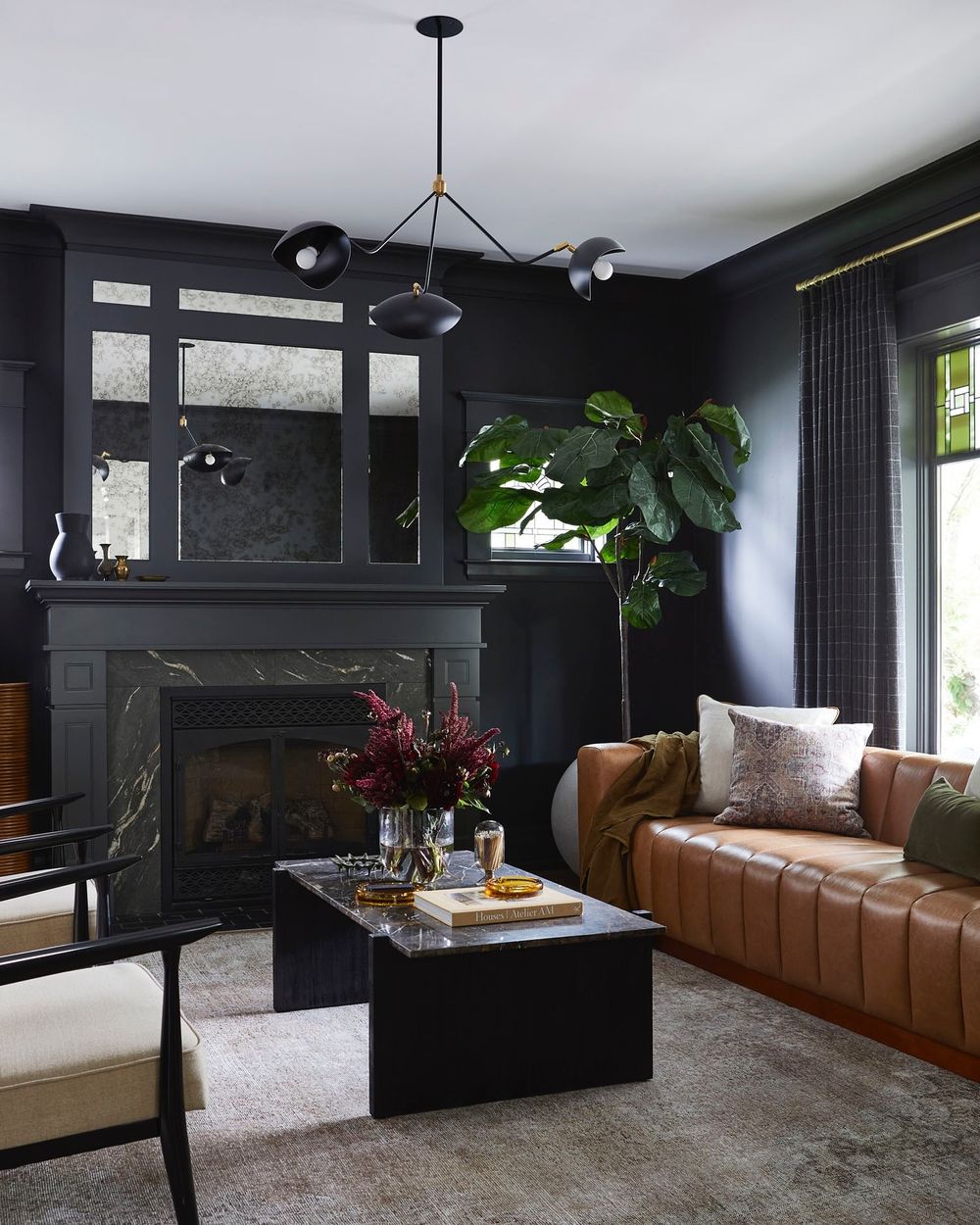 Dark and moody living rooms fireplace