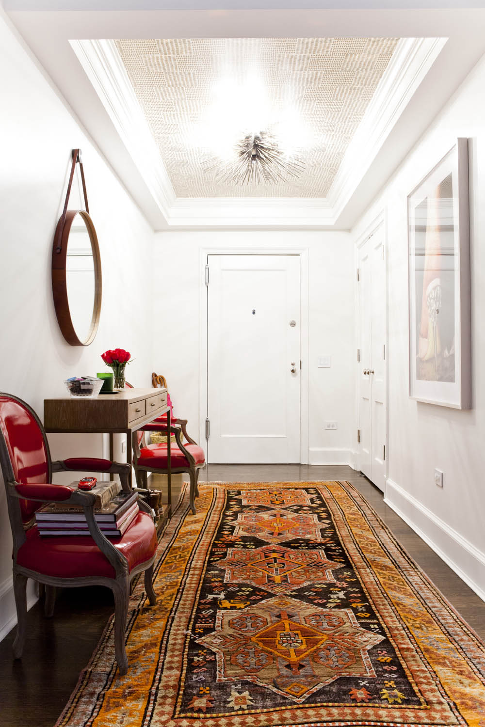 Entryway with Oriental Orange Rug via Social Stylate