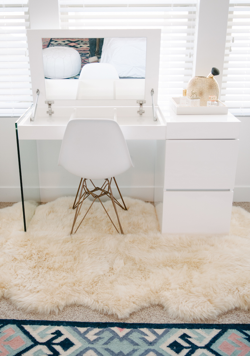 Minimal white vanity with pull open mirror