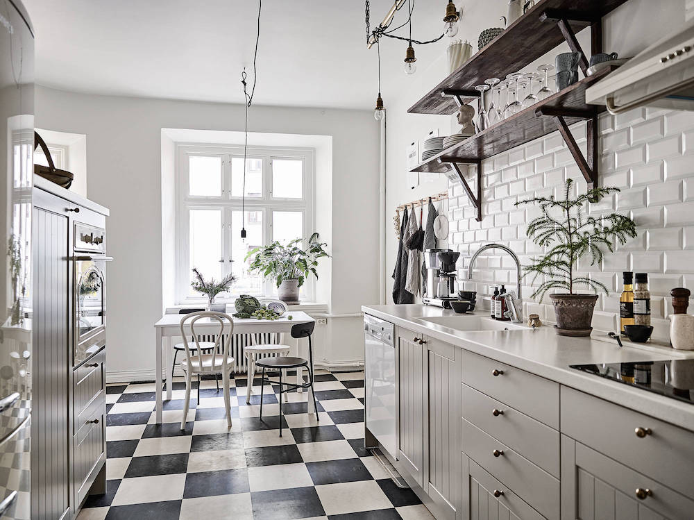 Scandinavian kitchen with black and white tiling