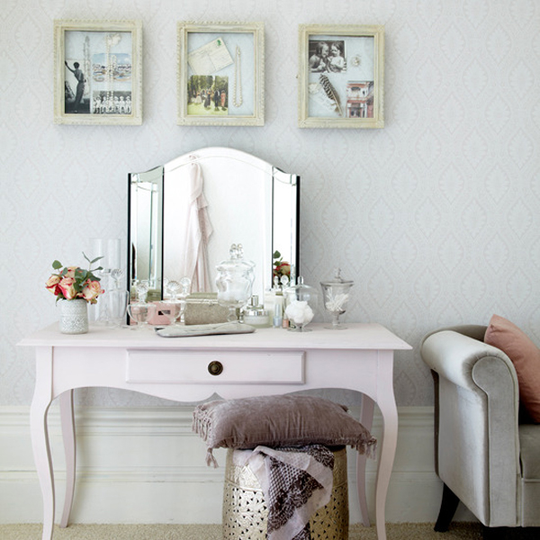 Soft pink vanity with trifold mirror