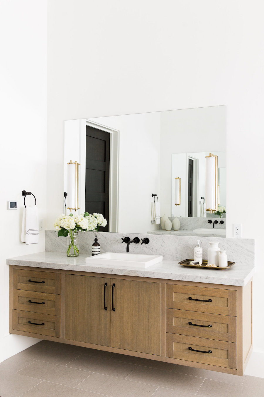 Wood Vanity with Marble countertop and Black Faucet