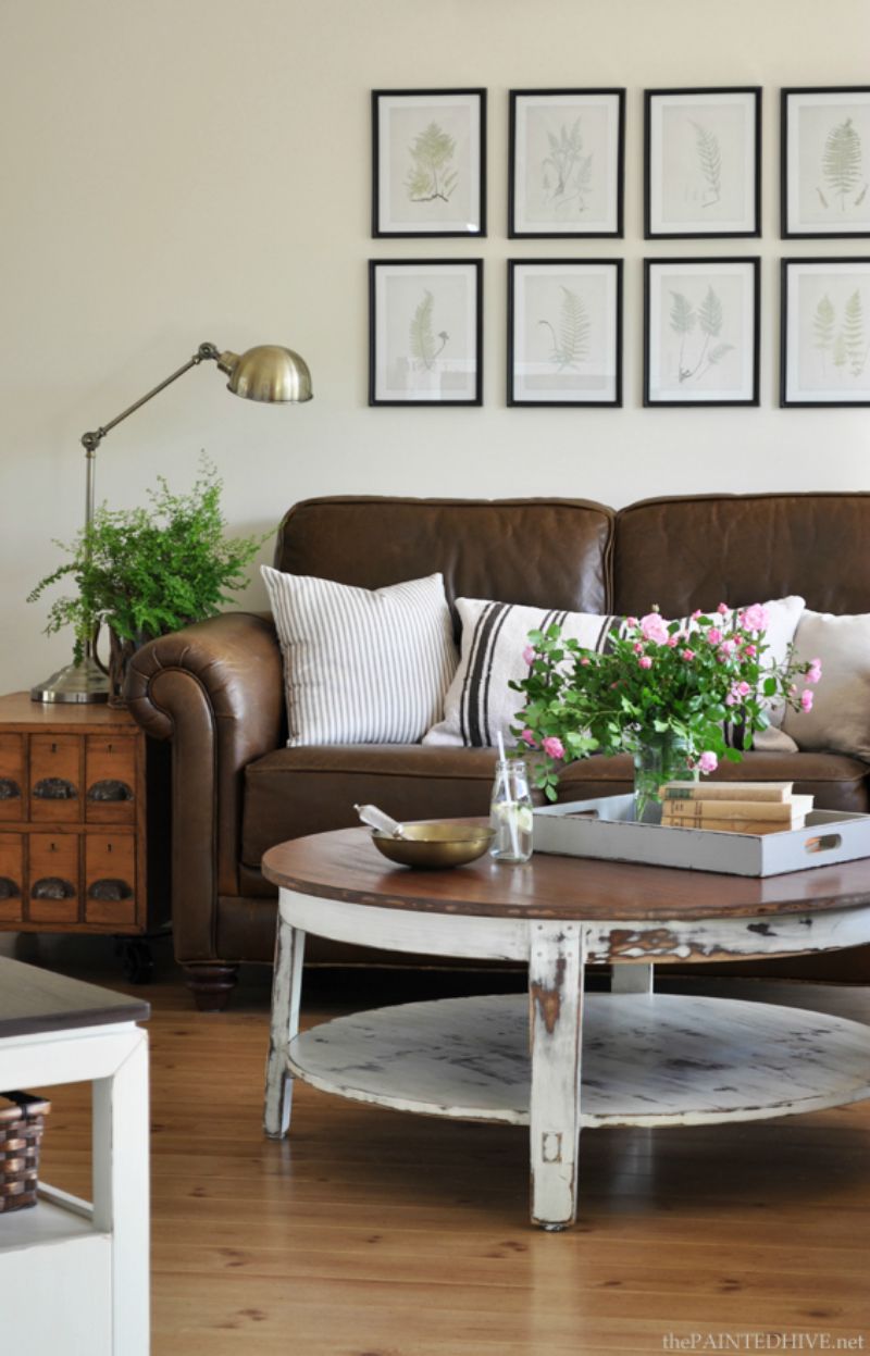 Brown leather sofa with distressed coffee table