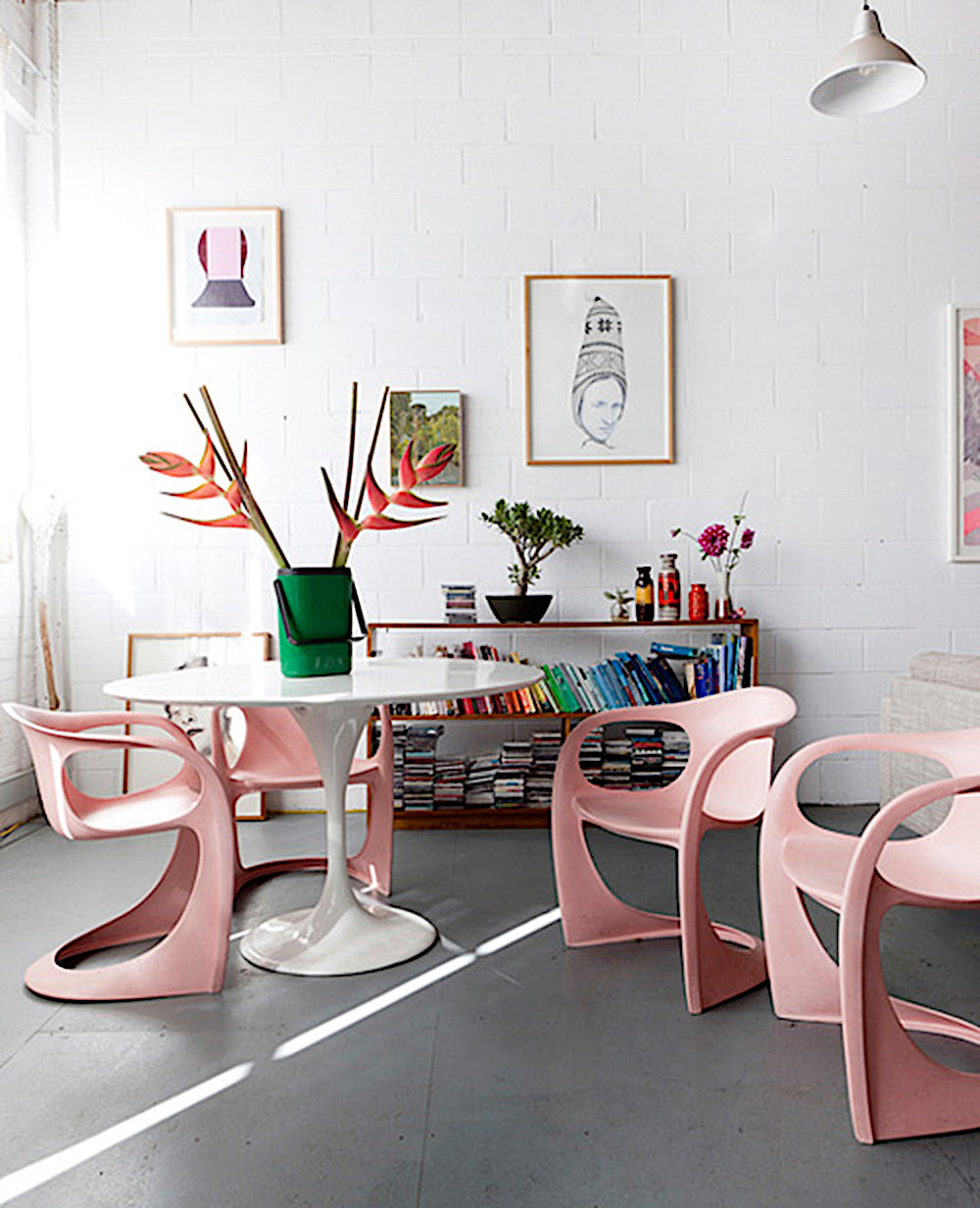 Dining room with blush pink chairs