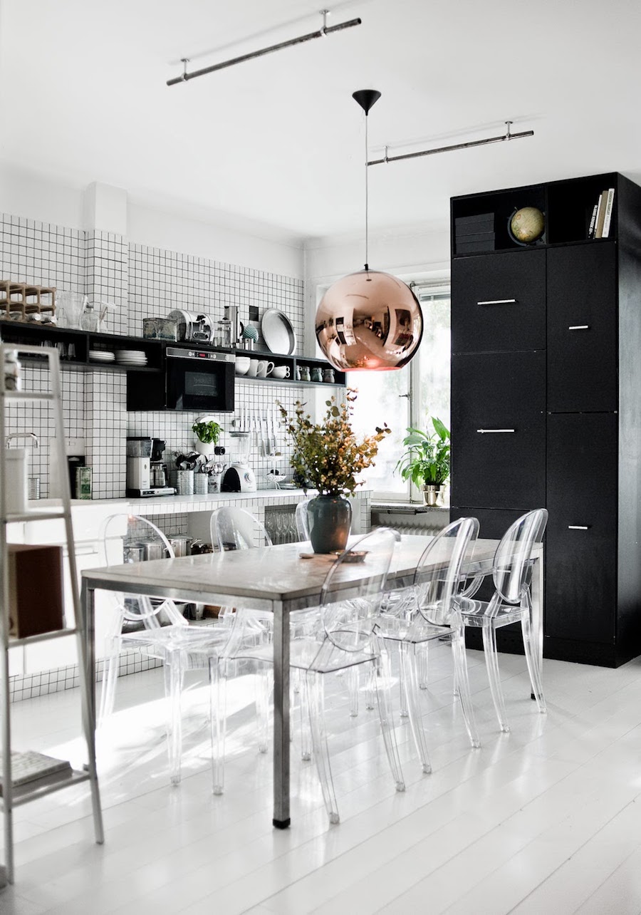 glass table and ghost chairs