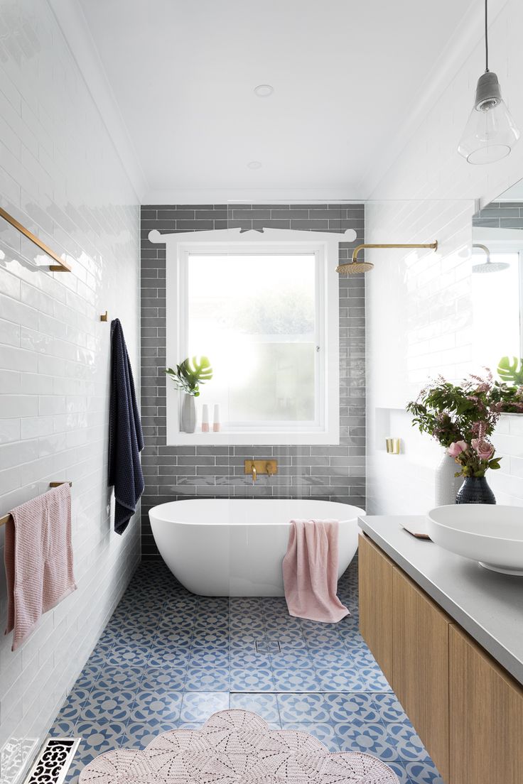 Grey tile accent wall bathroom