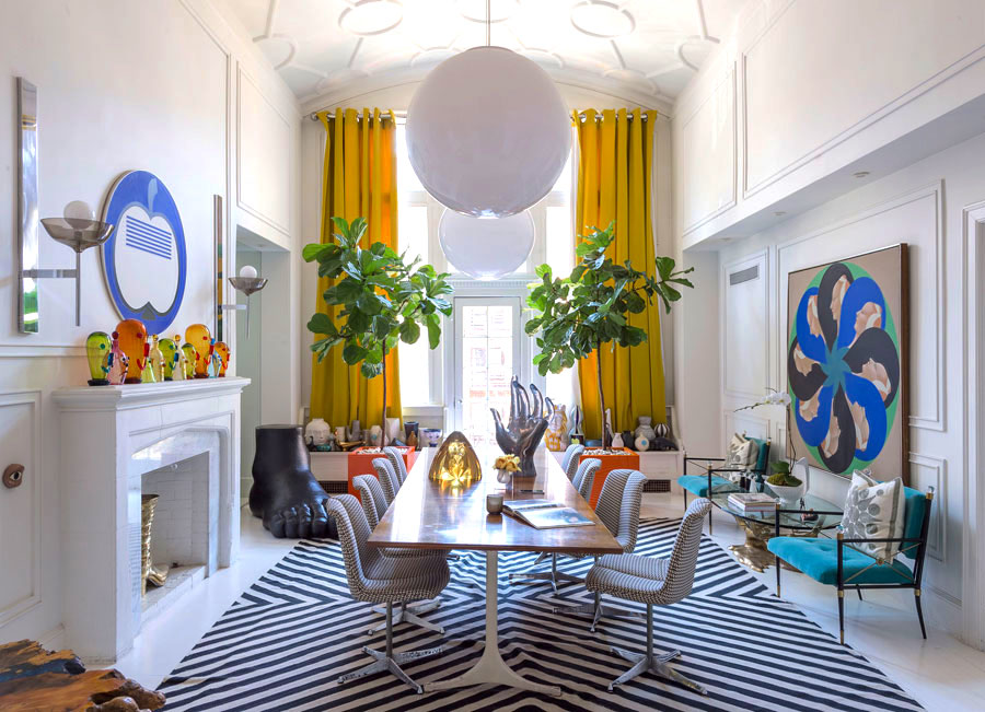 Jonathan Adler dining room with yellow curtains