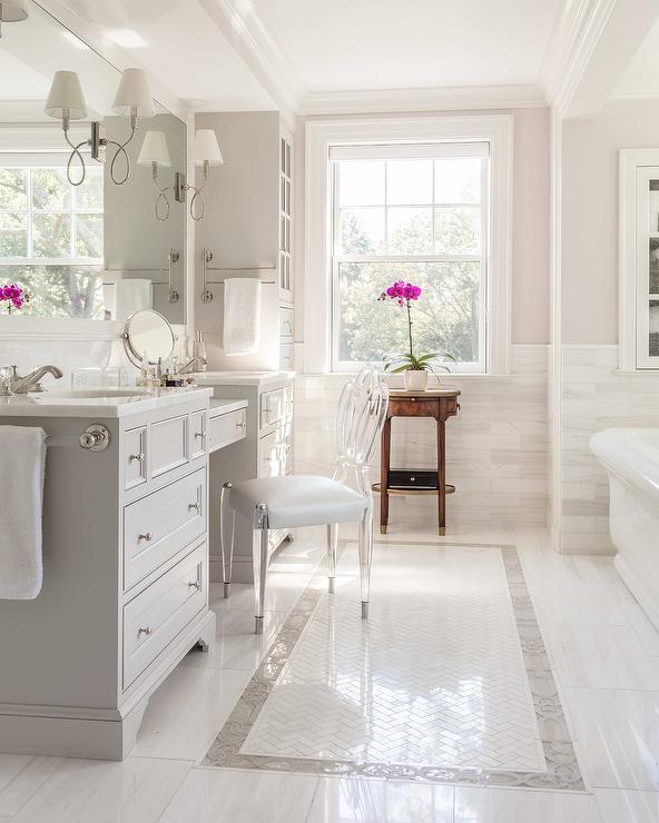 Ghost chair inside grey bathroom vanity