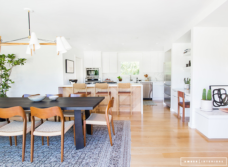 Minimalist Mid-Century Dining room with view into kitchen