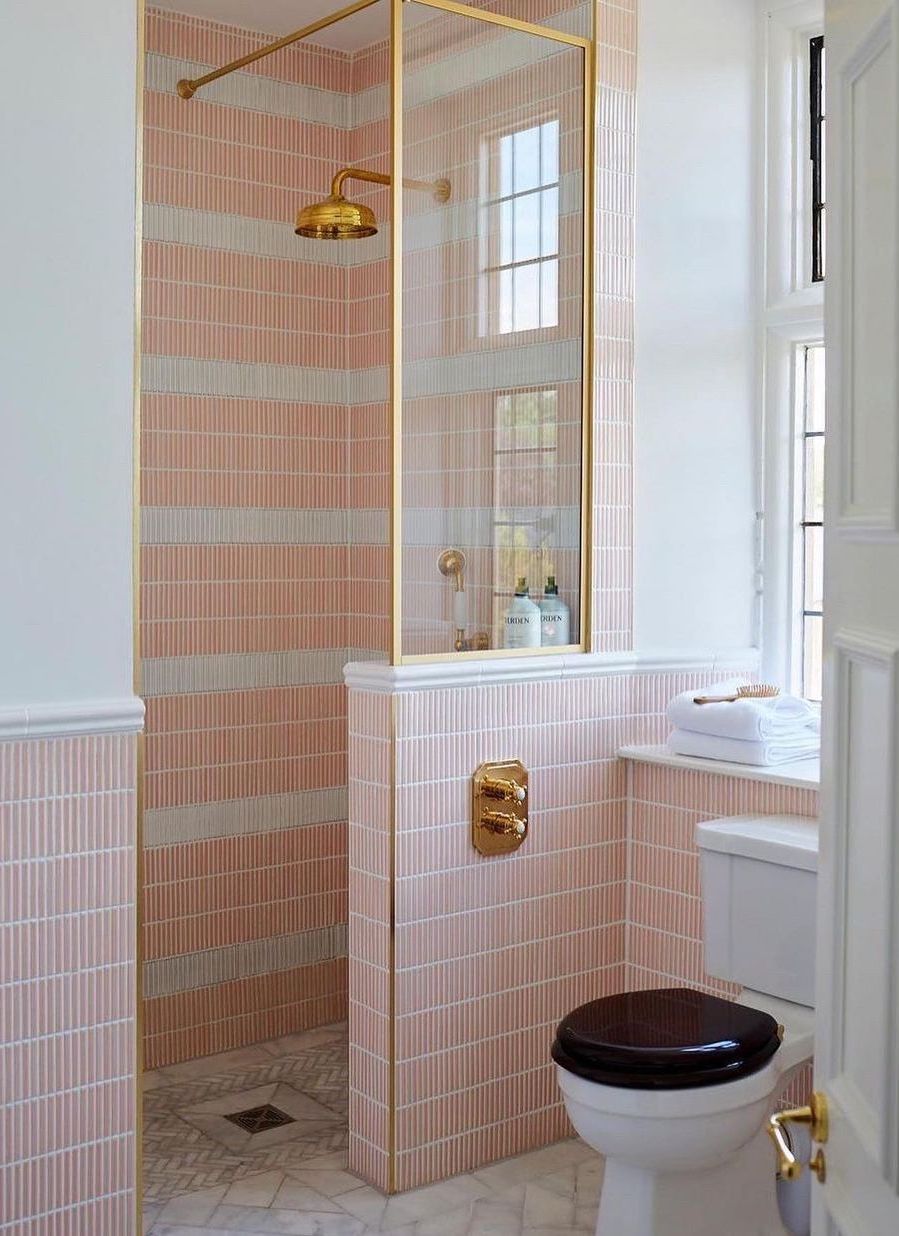 Pink bathroom verticle tile brass