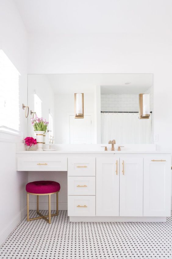 White bathroom with magenta stool