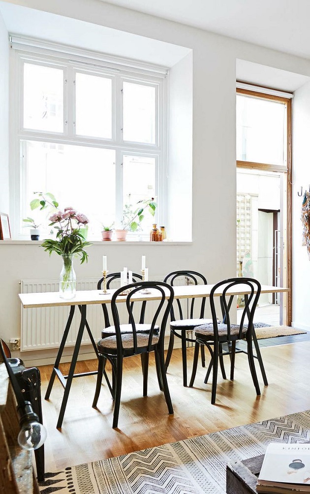 Bentwood chairs in bright dining room