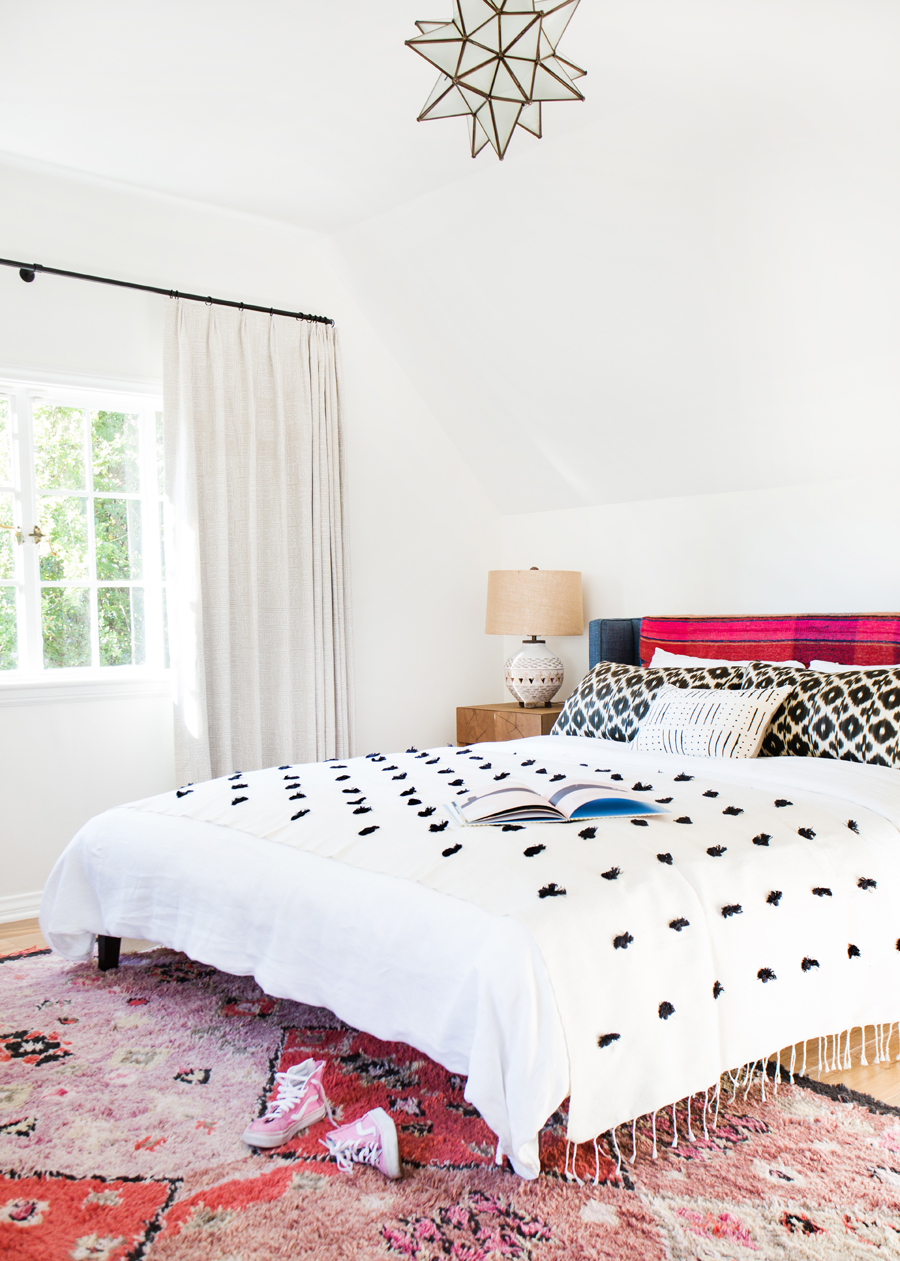 Bohemian Bedroom with starburst chandelier via Amber Interiors