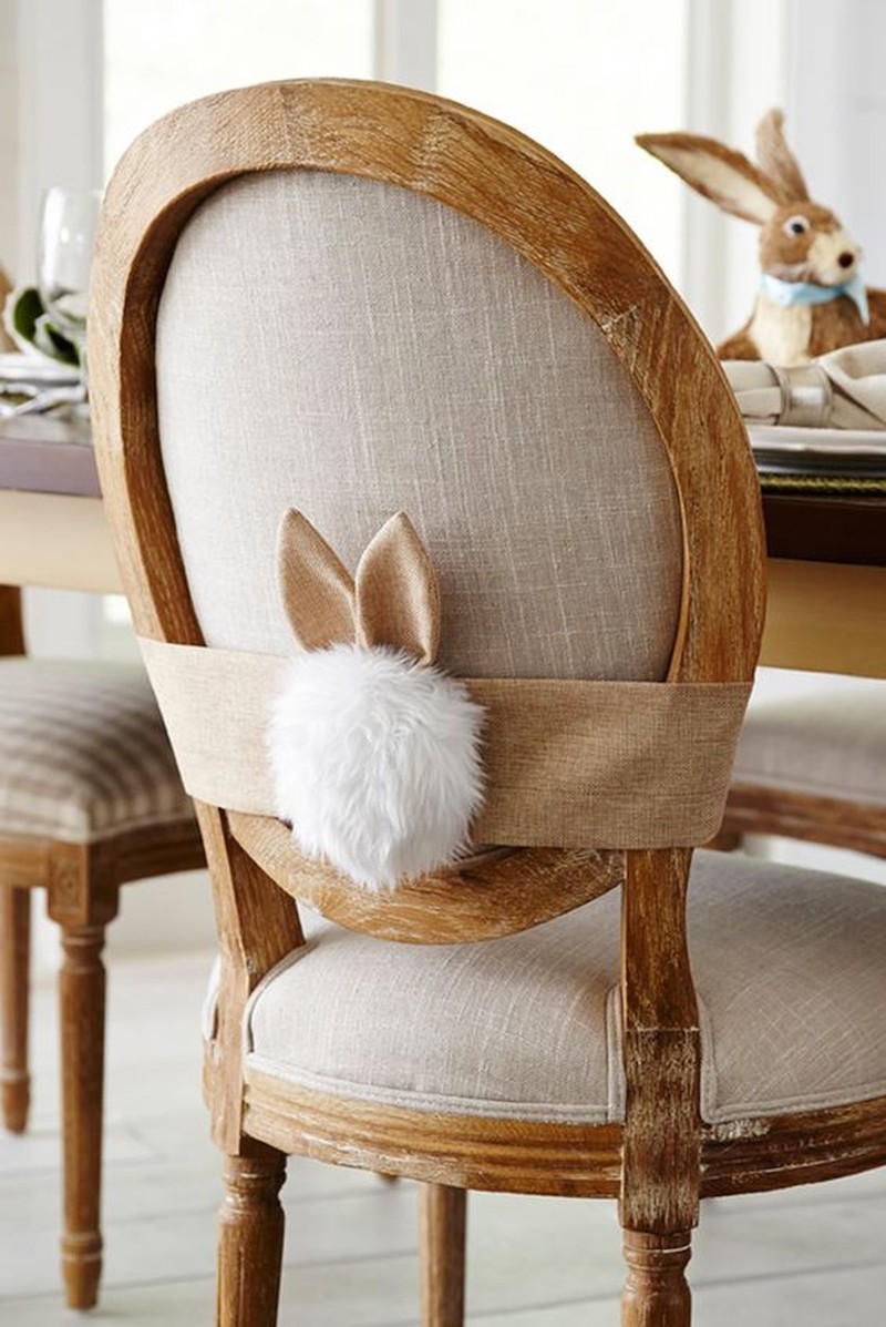 Bunny tail decor on back of dining chair