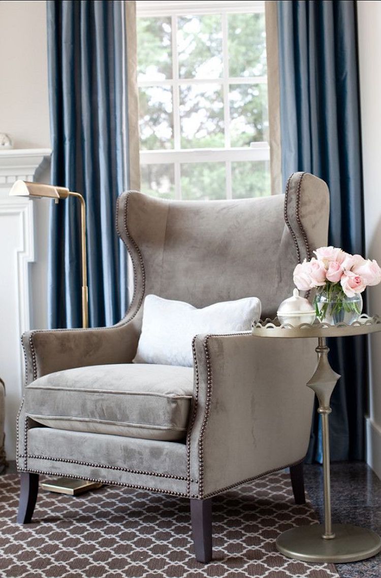 Dark brown wingback chair via Elizabeth Reich