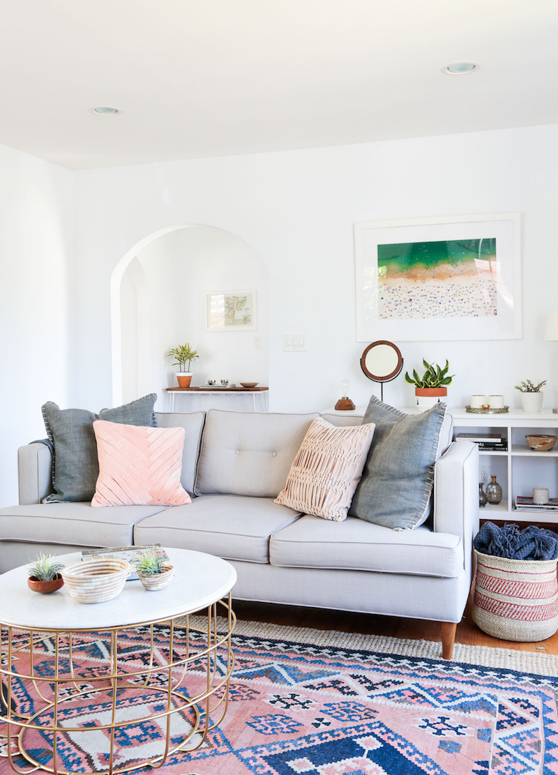 Grey sofa in California living room design by Haley Weidenbaum