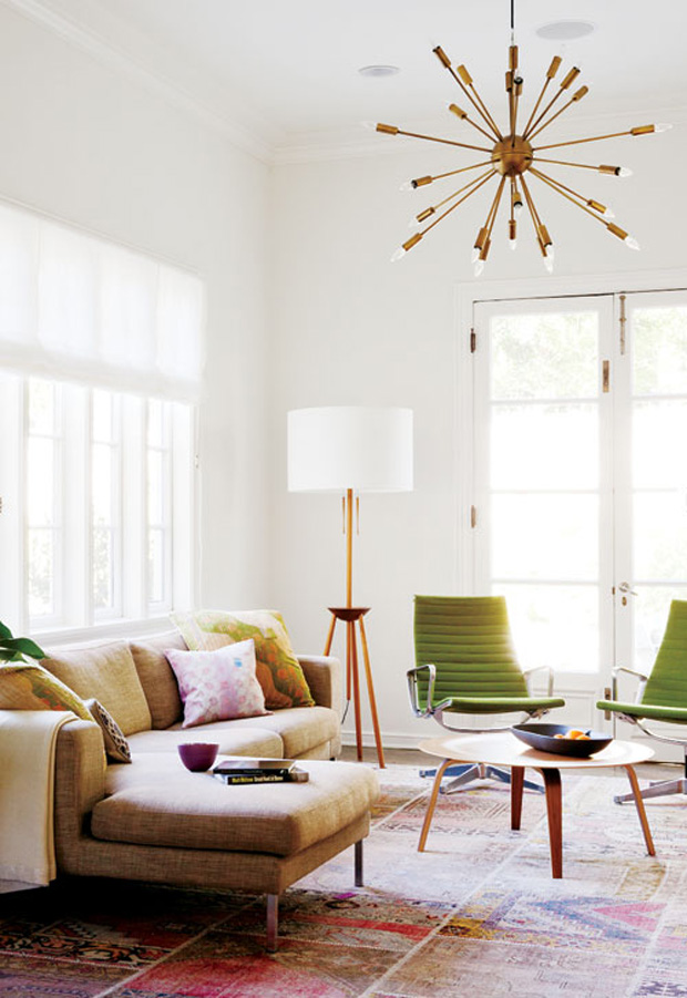 Midcentury-modern living room with sputnik chandelier via Style At Home