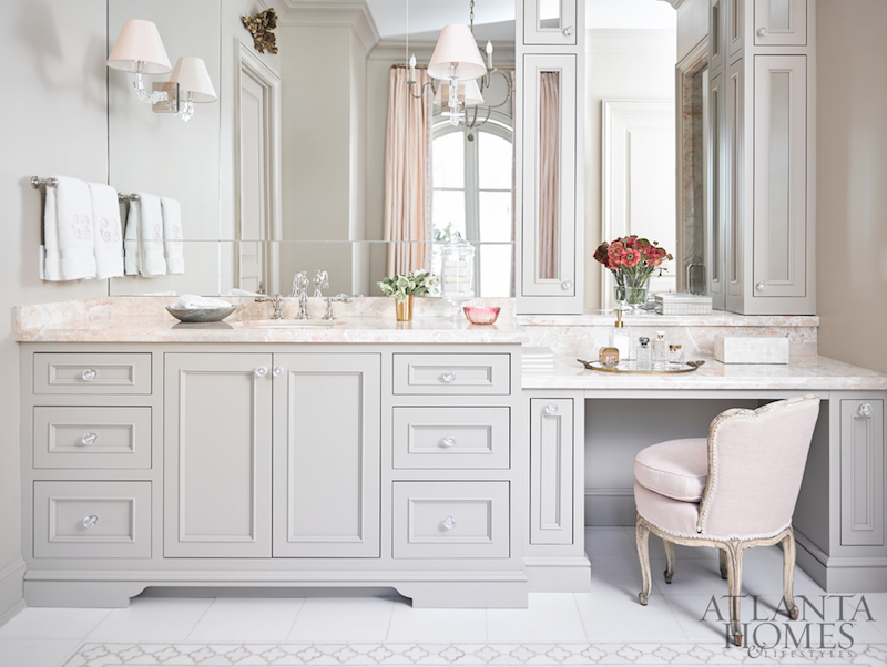 Pale pink countertop in feminine bathroom