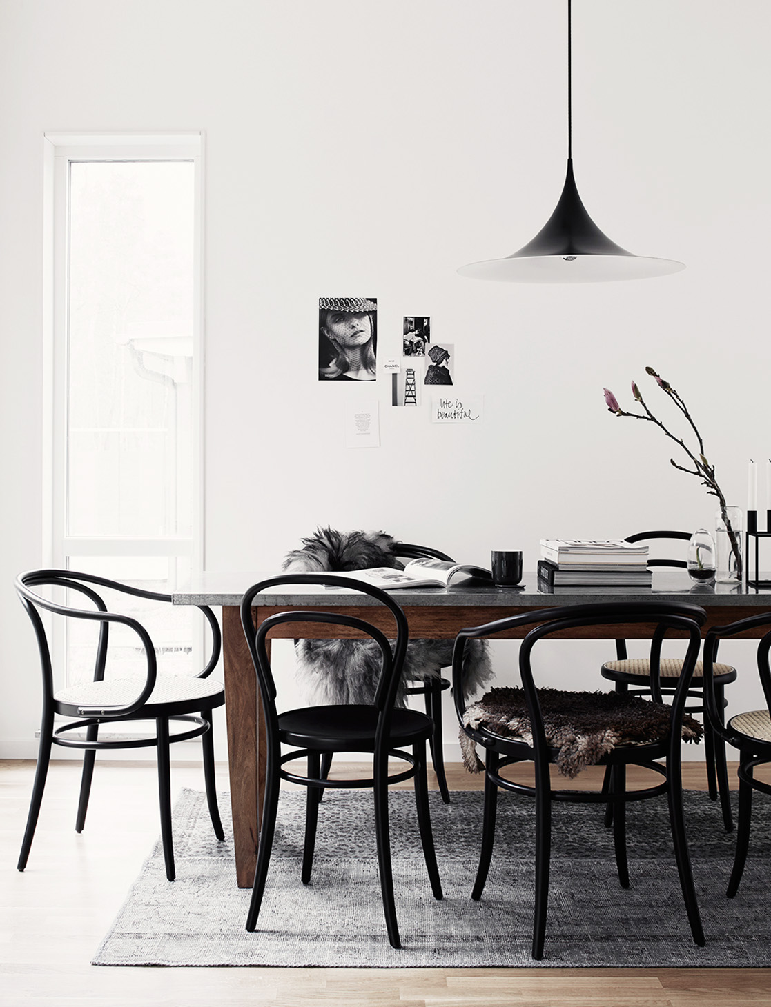 Scandinavian dining room with black bentwood chairs via Ton.eu