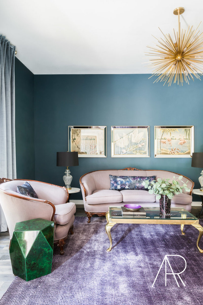 Starburst Chandelier in Teal Wall Living Room with purple rug via Alyssa Rosenheck MyDomaine