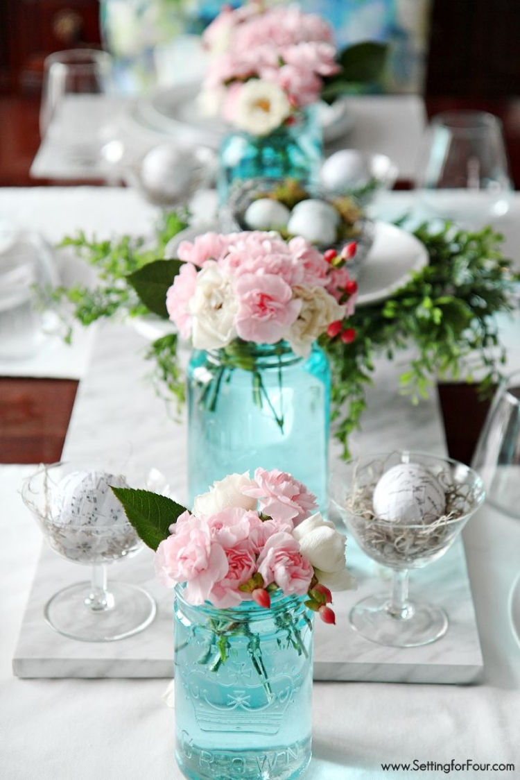 Turquoise flower vases table setting