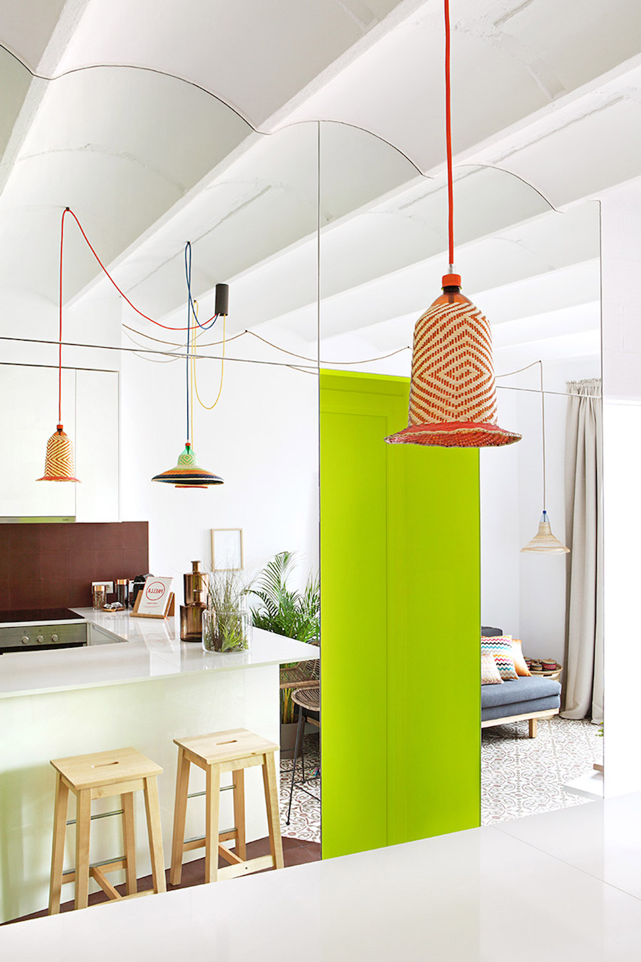 Barcelona kitchen with neon yellow accent wall