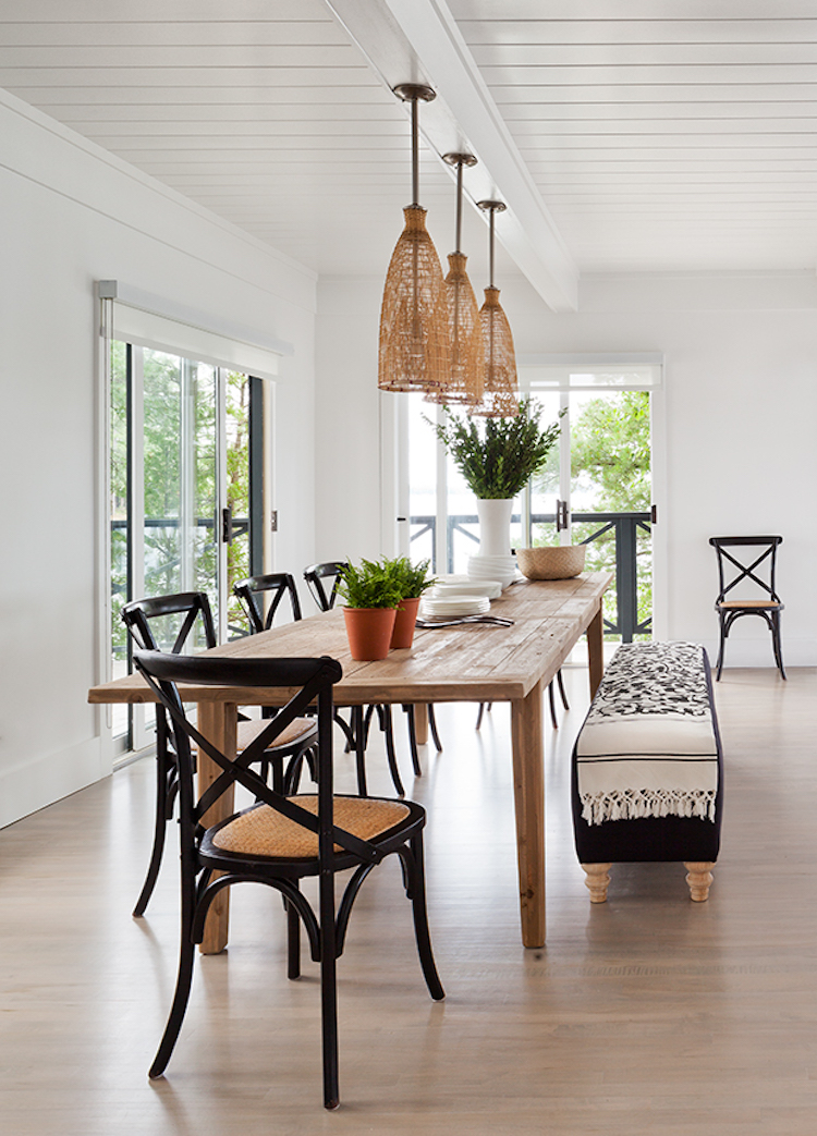 Black x-back chairs in dining room via House & Home Lloyd Ralphs Design