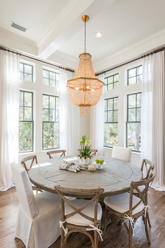 Cross back dining chairs in Beach House Dining Room Designed by Old Seagrove Homes