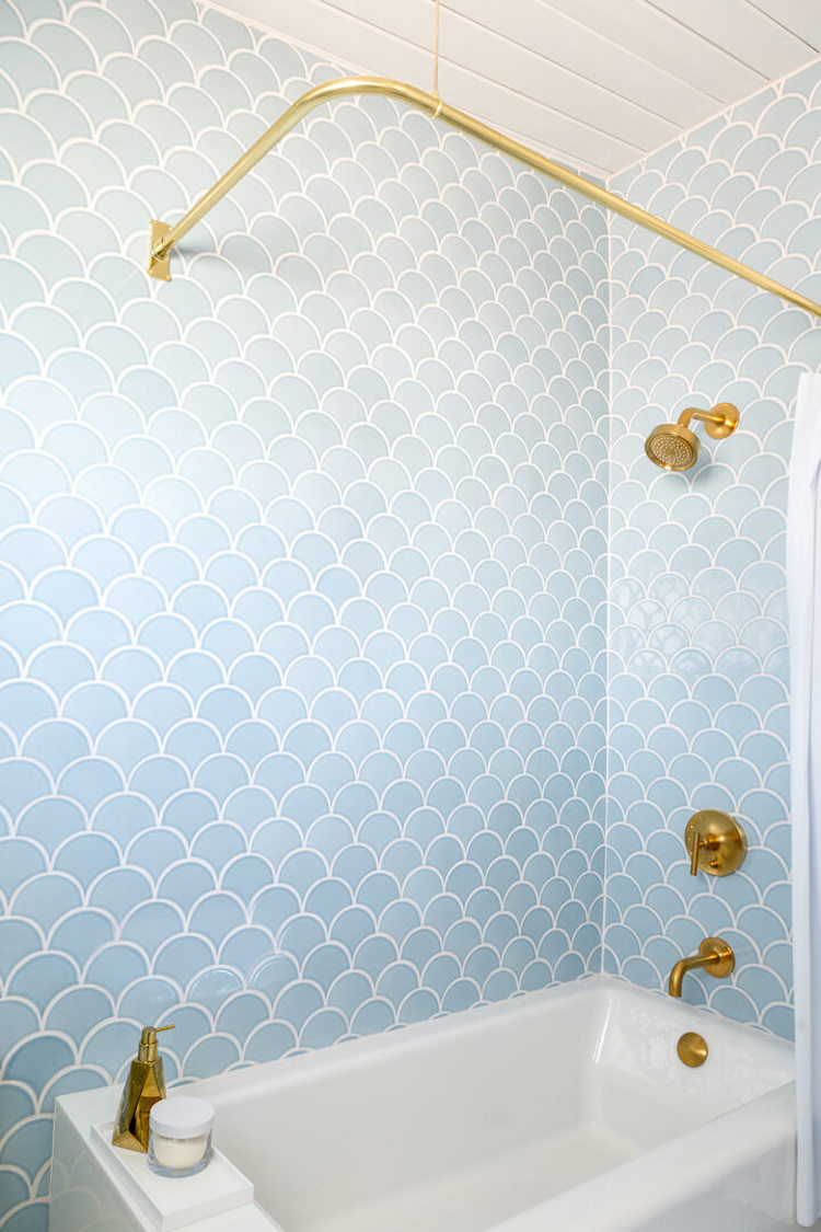 Emily Henderson's Blue Scallop Tiled Bathroom with Gold Brass Curved Rod